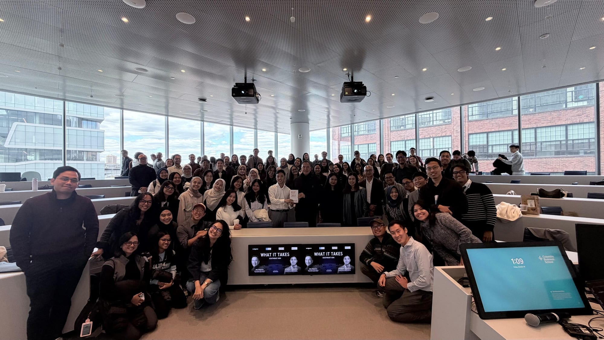 Group photo of Columbia students and attendees with Pak Gita after the event